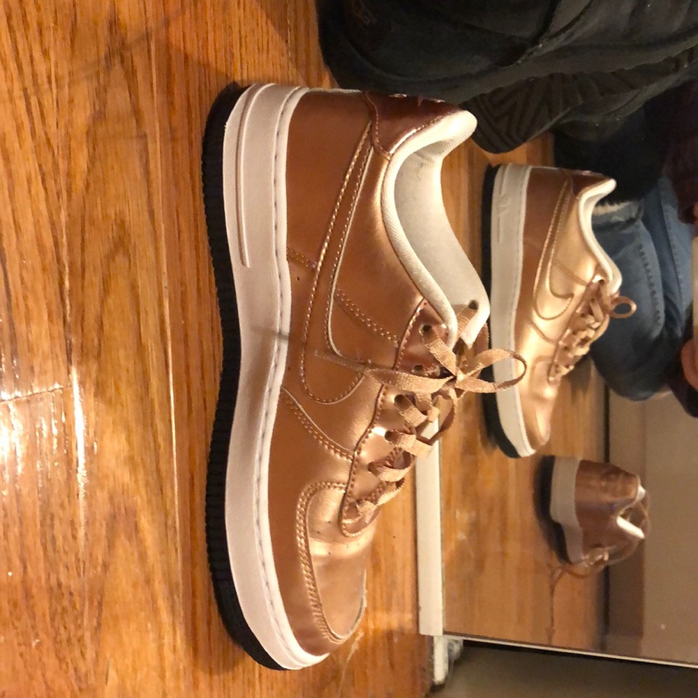 These are a size 4Y Nike never worn brand new